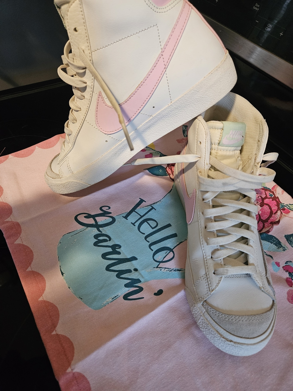 Nike Women's White High-Top Sneakers with Pink Swoosh
